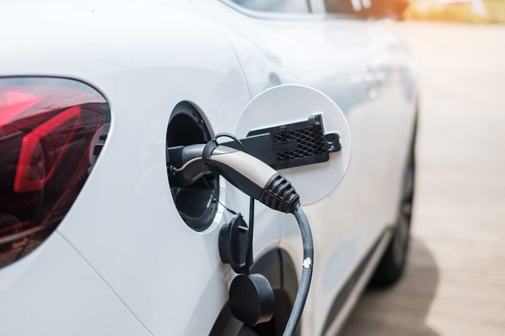 electric car charging battery at ev charger station
